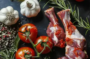 Lapin épicé à la harissa, ail et tomates confites à l'huile d'olive